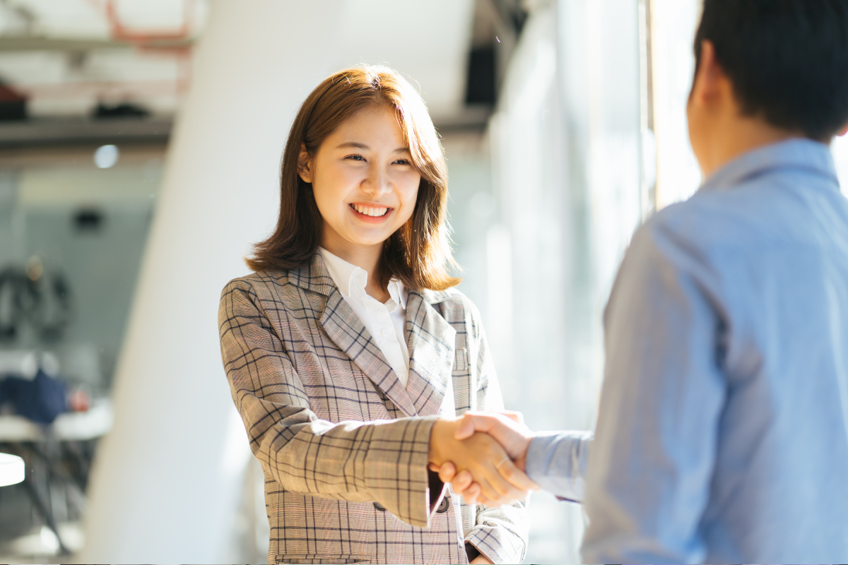 business woman shake hands