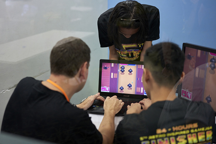 students playing computer game at Retro Inspired 2019