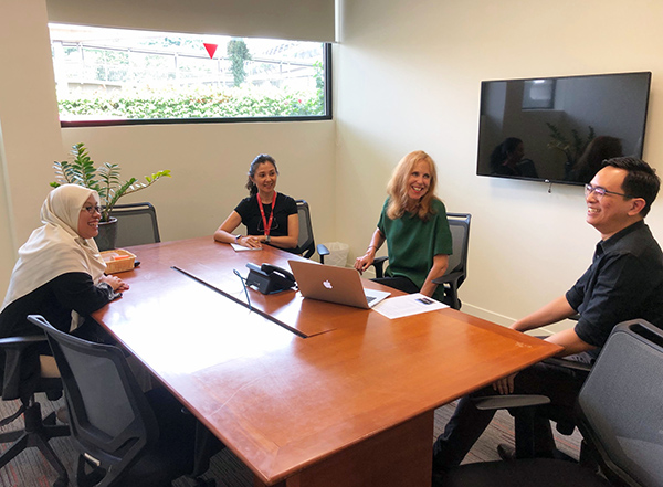 Professor Sian Coker (third from left) with Psychology Placement Coordinator at JCU in Singapore, Ms Chua Kah Lin (second from left), and two Master of Psychology students